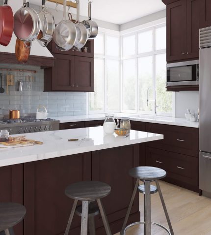 A modern kitchen featuring stainless steel appliances and elegant wooden cabinets.